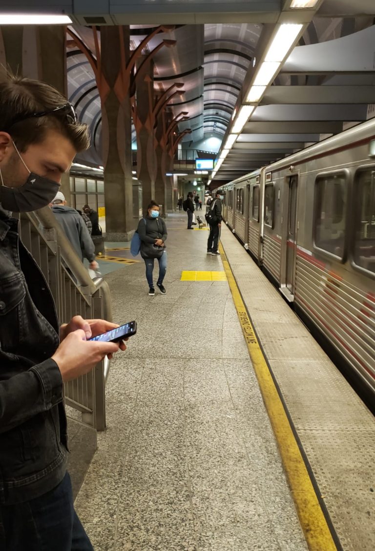 Picture of me on my phone in a subway