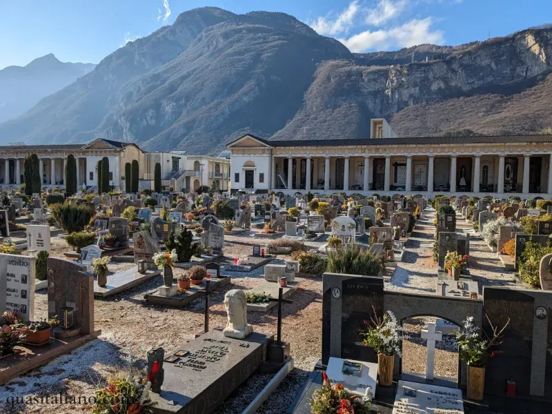 trento cimitero with mountain in the background