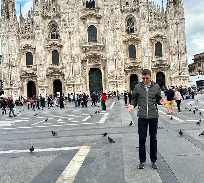 guy standing in front of milan duomo