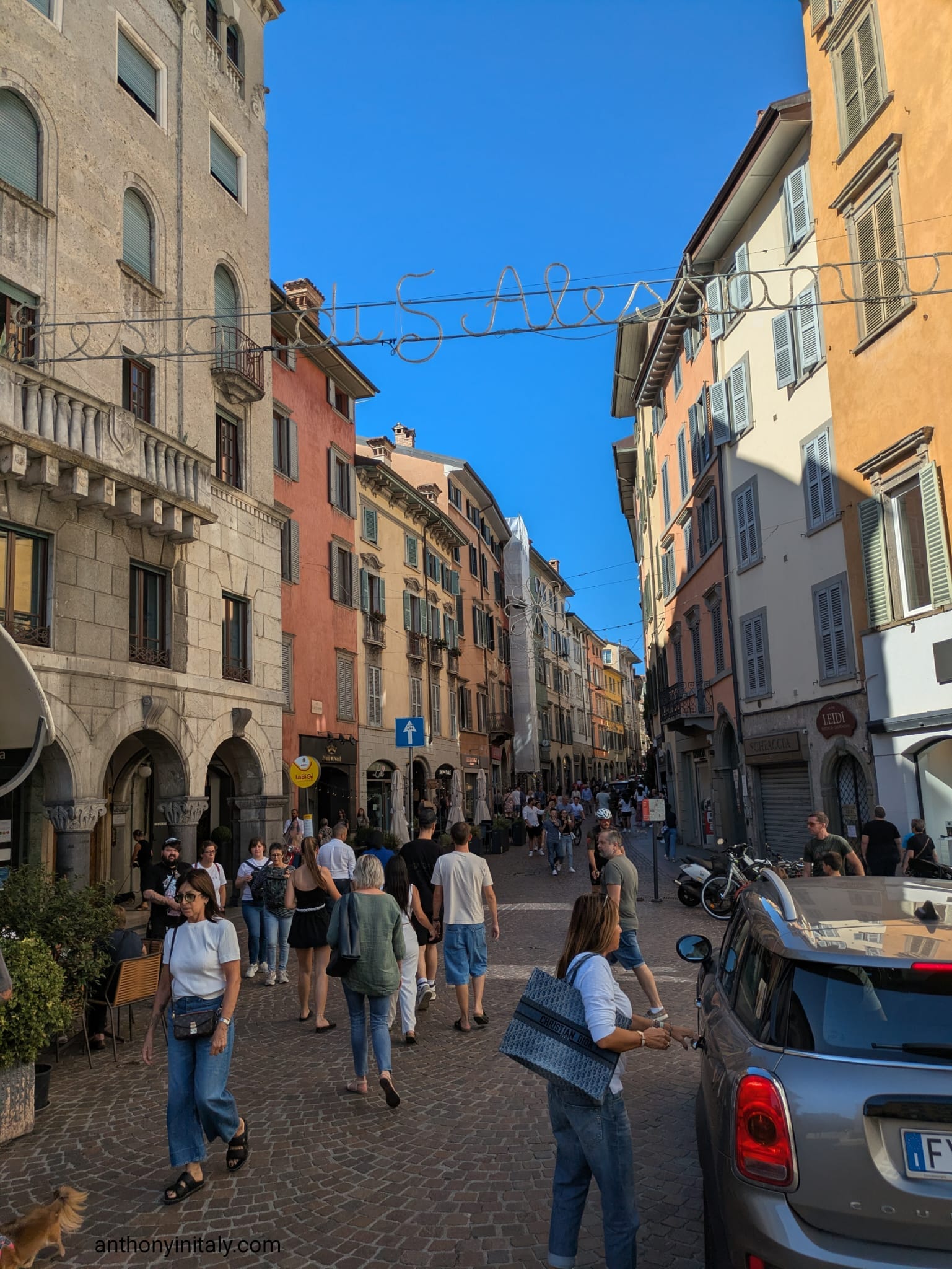 Pedestrian street scene at Piazza Pontida in Bergamo's lower town