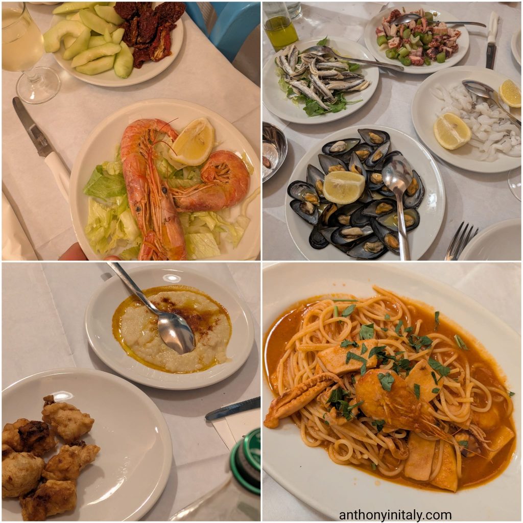 Mixed seafood antipasto at Osteria Perricci in Monopoli: prawns, marinated anchovies, octopus salad, raw squid, mussels and seafood spaghetti
