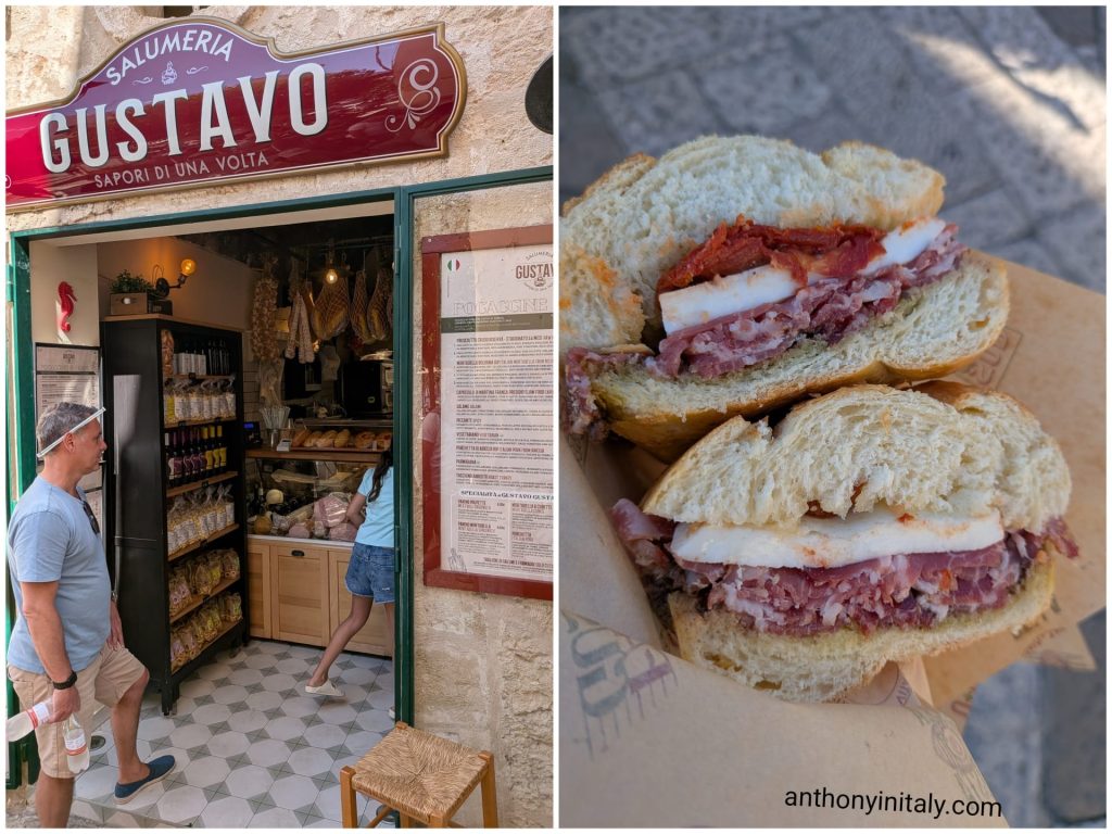 Storefront of Salumeria Gustavo in Monopoli and a sandwich with cured ham, cheese and sun-dried tomatoes