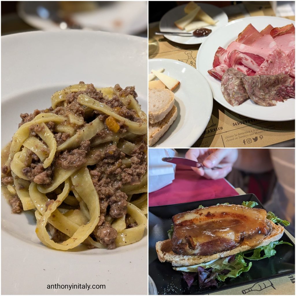 Tagliatelle with white meat ragù, a plate of Umbrian cured meats with cheese, jam, and bread, and glazed pork belly on toasted bread with greens at Bottega del Vino in Perugia